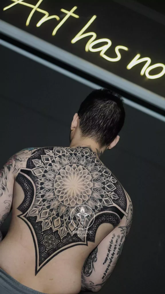 Fullback blackwork & ornamental style tattoo by Nguyen Dat Torch INK